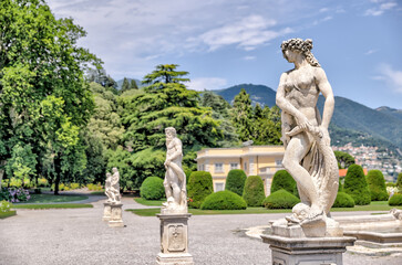 Fototapeta na wymiar Lake Como, Italy - July 4, 2022: The public grounds and gardens of Villa Olmo on the shores of Lake Como, Italy 