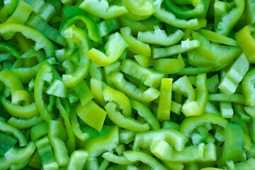 Texture slices of chopped green bell pepper.