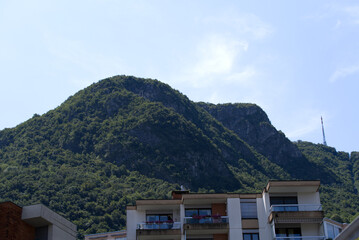 Looking up local mountain San Salvatore on a sunny summer day. Photo taken July 4th, 2022, Lugano, Switzerland.