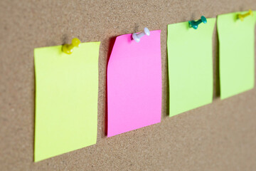 Fototapeta premium paper note pin on cork board. Blank notes for add text message.