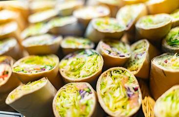 Freshly prepared tortilla wraps sold in a fast food restaurant