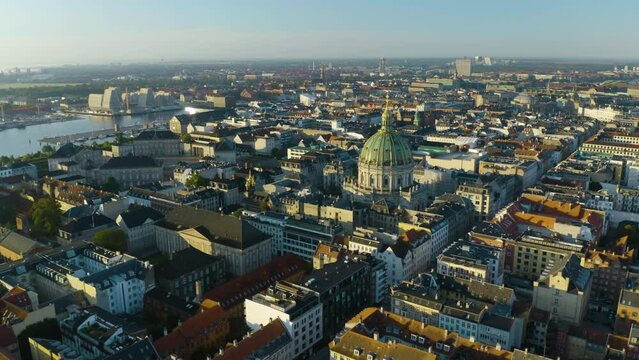 Drone Ascends to Reveal Frederik's Church and Greater Copenhagen City at Golden Hour