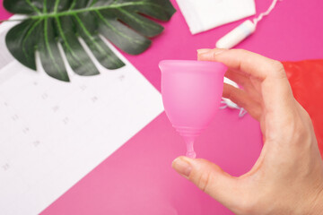 menstrual cup in female hand, hygiene product reusable eco-friendly zero waste