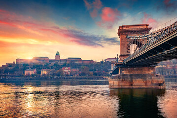 First sunlight glowing Budapest town, capital of Hungary, Europe. Amazing summer view of ChainBridge on Danube river. Traveling concept background. - obrazy, fototapety, plakaty