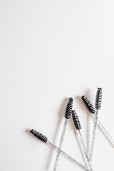Brush for combing eyebrow hairs. Background for text