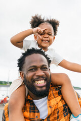 Portrait happiness family daddy and his baby girl hang out together at outdoor. father days.