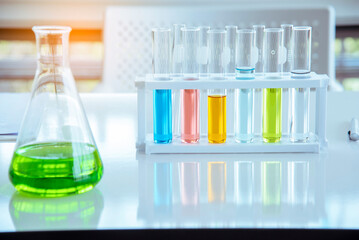 Science chemistry glass tubes objects on lab background. Liquid tube biology laboratory chemical fluid scientist object testing tubes medical glassware. Chemistry scientific pharmaceutical background