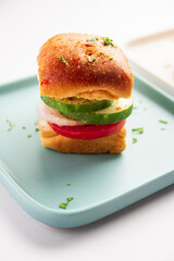 Mumbai style pav sandwich or leftover paav used for veg burger