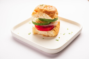 Mumbai style pav sandwich or leftover paav used for veg burger