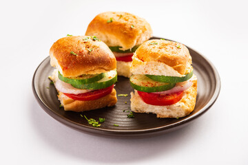 Mumbai style pav sandwich or leftover paav used for veg burger