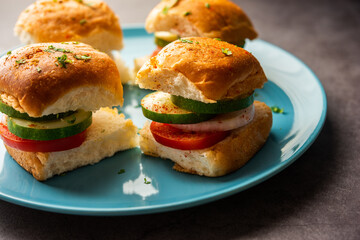 Mumbai style pav sandwich or leftover paav used for veg burger