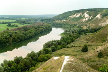 Fototapeta na wymiar Mid summer landscape of chalk mountins and hills at Don River valley, Storozhevoe, Voronezh region, Russia