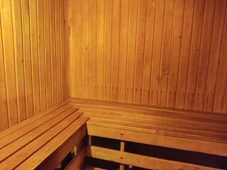 Obraz na płótnie Canvas Inside the village bath. Russian bath. Wooden walls. Wooden bench.
