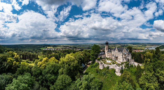 Germany, Bavaria, Coburg, Helicopter panorama of clouds over Callenberg Castle and surrounding landscape