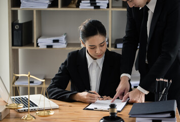 Concepts of Law and Legal services. lawyer business working on digital tablet and law,