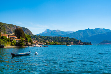Fototapeta na wymiar Panorama on Lake Como, with the villages of Tremezzina, Bellagio and the mountains that overlook them. 
