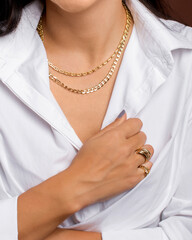 close up of a woman with jewelry