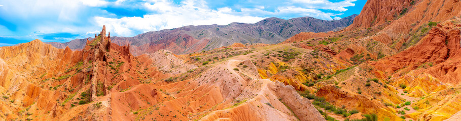 Natural unusual landscape red canyon of extraordinary beauty is similar to the Martian landscape. Multi-colored canyon fairy tale in Kyrgyzstan. Charyn Canyon. Amazing beautiful landscape. - obrazy, fototapety, plakaty