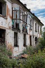 abandoned destroyed apartment building on the outskirts