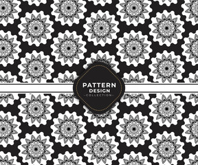 Sketch of white mandala pattern on a black background