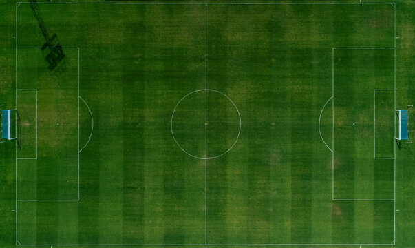 zenithal aerial view of a natural grass soccer ground