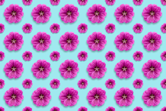 Pattern Of Purple Flowers On A Turquoise Background