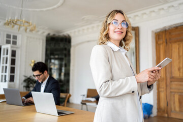 A female creative manager and a male colleague are working on a startup project