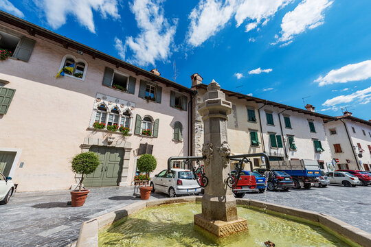 Venzone town hall square (Piazza Municipio), almost completely destroyed by the 1976 earthquake and later rebuilt. Udine province, Friuli-Venezia Giulia, Italy, Europe.