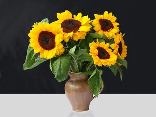 posy of sunflowers in ceramic pot