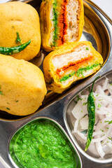 Ulta Vada Pav is made with a spicy potato stuffed bun, called pav inside vada, inside out wada pao