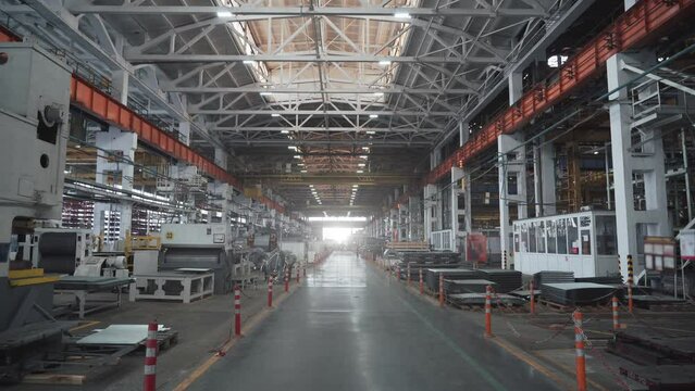 Interior of modern big industrial factory building inside.