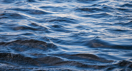Blue sea or ocean water surface background.