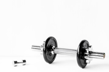 Fototapeta premium dumbbell Exercise for good health. backdrop for idea concept art work design or add text