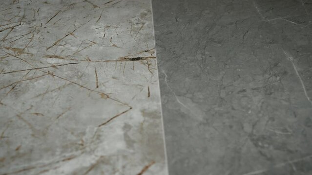 Textures and pattern of porcelain stoneware tiles with a surface imitating stone. Practical and durable materials for interior decoration