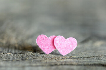Two pink hearts. A symbol of lesbian love