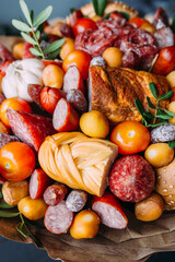 Delicious edible bouquet of sausage, tomatoes, cheese. Gift for man.