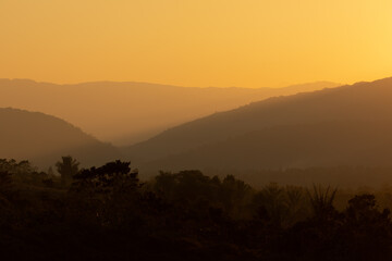 Landscape of the sunset mountains of Lore Lindu national park, near Bomba, South Lore, Poso Regency, Central Celebes, Indonesia