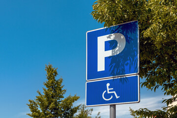 Reserved parking space sign, handicapped person with disability in wheelchair pictogram