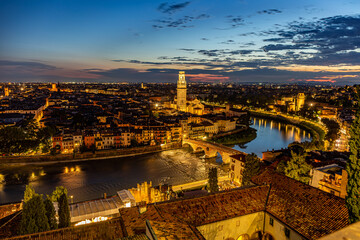 aerial night view of the Pietra bridge and the cathedral of Verona