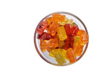 jelly candy. Fruit jelly bears in different flavors and colors. sweets are in a transparent bowl isolated on white. top view. copy space