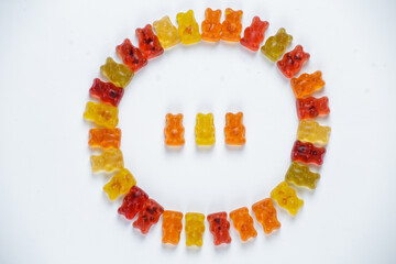 jelly candy. Fruit jelly bears in different flavors and colors. sweets lie like a circle. top view. copy space
