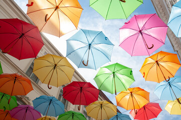 Fototapeta na wymiar View colorful umbrellas in the sky.