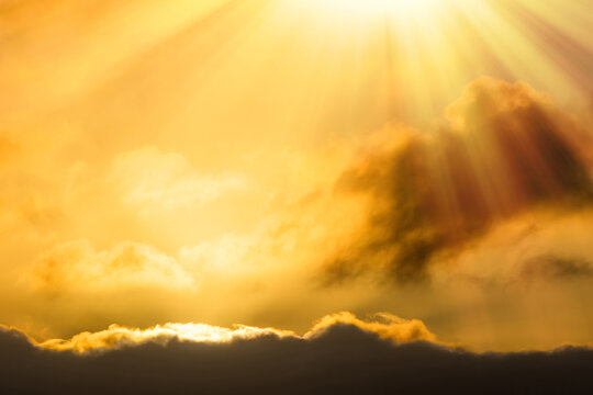 Heavenly light. Spritual sunbeam above clouds. Soft sky background image