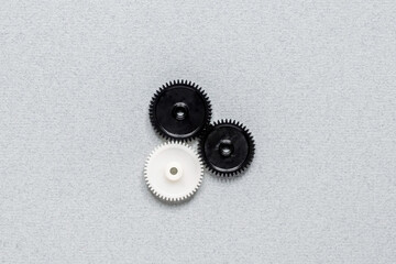 Three gears are connected to each other. Teamwork, strategy. Concept