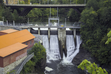 Fototapeta premium CANADA, Sherbrooke - AUGUST 25, 2022: hydroelectric dam Abenaquis electricity power station in Quebec