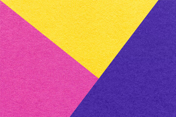Texture of craft bright purple, navy blue and yellow shade color paper background, macro. Vintage abstract cardboard