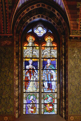 Obraz premium Holy Blood chapel, Figurative stained-glass window, Bruges, Belgium