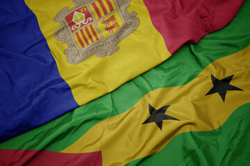 waving colorful flag of sao tome and principe and national flag of andorra.