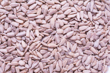 Peeled sunflower seeds top view. Healthy diet