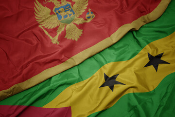 waving colorful flag of sao tome and principe and national flag of montenegro.